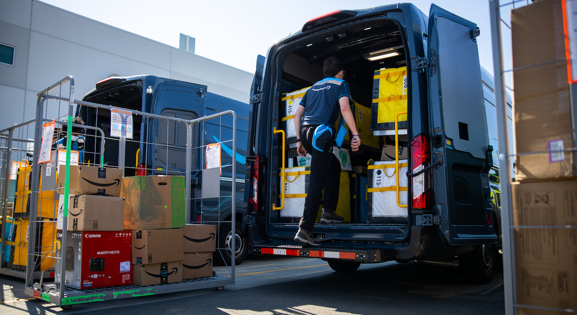 Amazon driver with loaded van